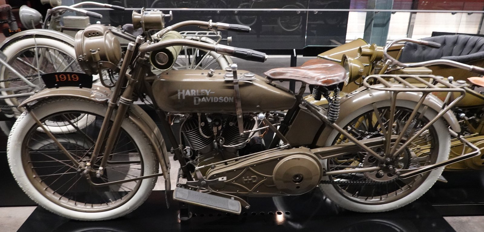A preserved 1919 Harley-Davidson motorcycle built to US Army specification, on museum display