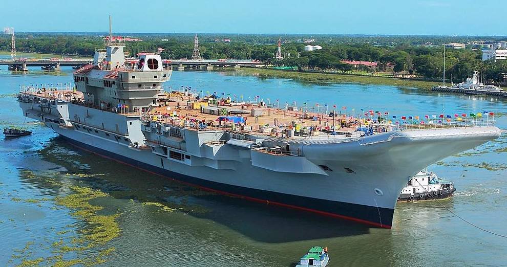 INS Vikrant, India's first indigenously built aircraft carrier, being undocked at Cochin Shipyard