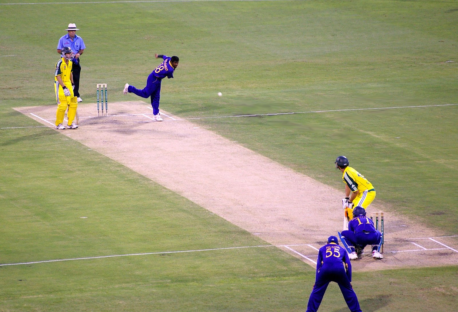 Muttiah Muralitharan bowling his distinctive off-spin action for Sri Lanka in a One Day International against Australia