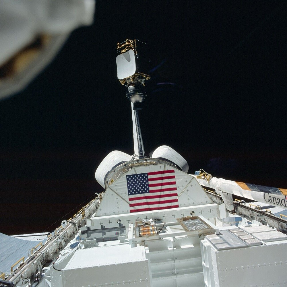 INSAT-1B satellite rising out of Space Shuttle Challenger payload bay during deployment, 30 August 1983