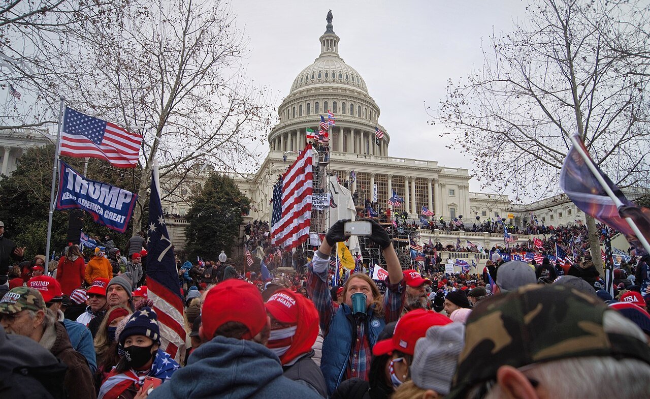 Crowd with Trump flags outside the west front of the US Capitol on 6 January 2021