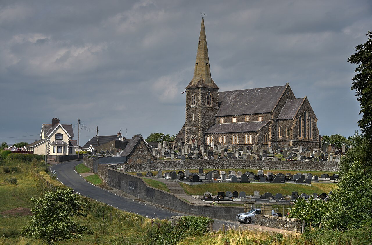 Drumcree Parish Church on its hill outside Portadown, with the road leading down towards the town