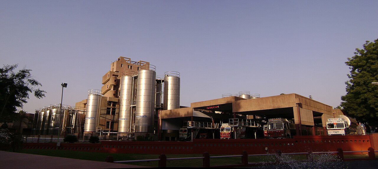 Amul dairy plant at Anand, Gujarat, with stainless-steel milk silos and tanker trucks