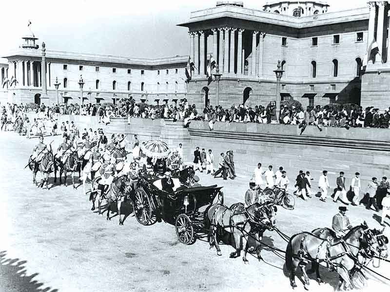 President Rajendra Prasad in the horse-drawn state coach passing the Secretariat buildings, 26 January 1950