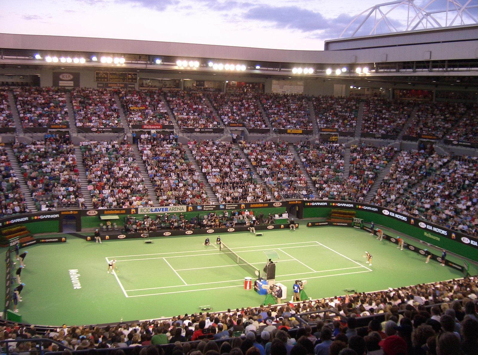 Interior view of Rod Laver Arena showing the blue hard court surface used at the Australian Open