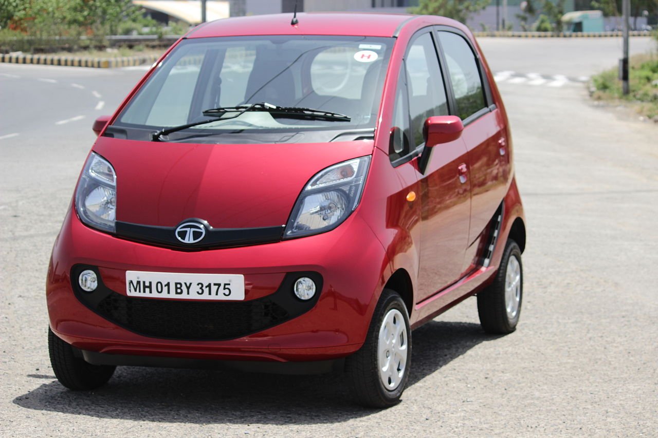 A red GenX Tata Nano, the 2015 version with an AMT option and openable hatch