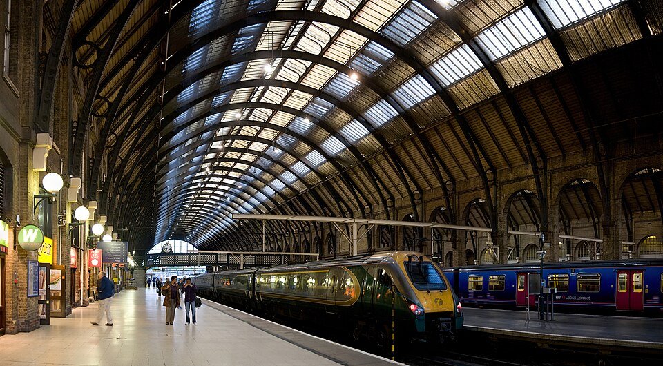 Platform at a major British railway station, showing the infrastructure passengers experience as one system regardless of which company runs the trains