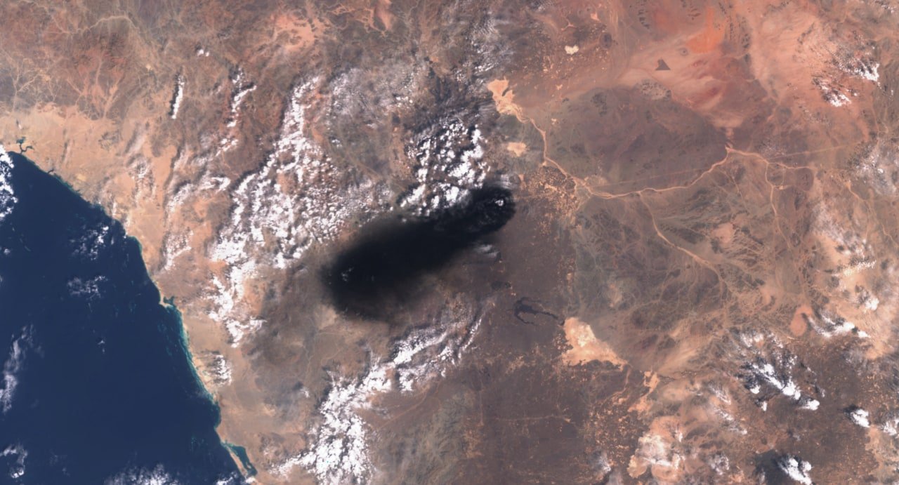 Satellite image of black smoke rising from the East-West crude oil pipeline route in Saudi Arabia, September 2026
