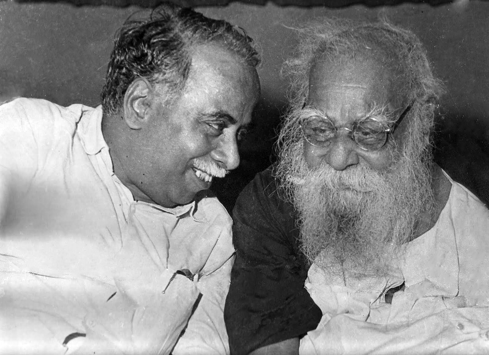 C. N. Annadurai and Periyar E. V. Ramasamy seated together