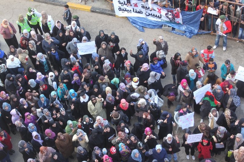 Women protest outside the Benghazi courthouse in 2011