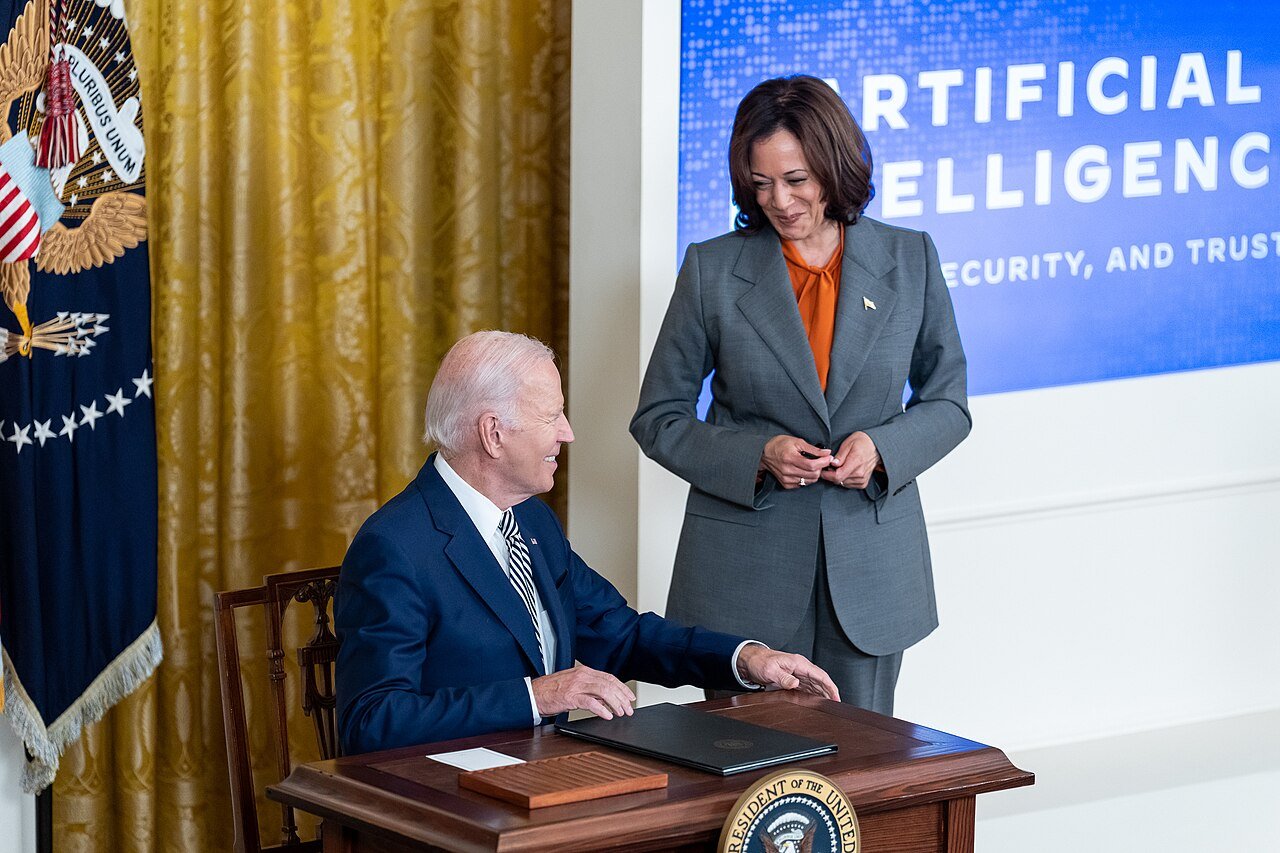 President Joe Biden signs Executive Order 14110 on AI safety and security in the East Room of the White House, 30 October 2023