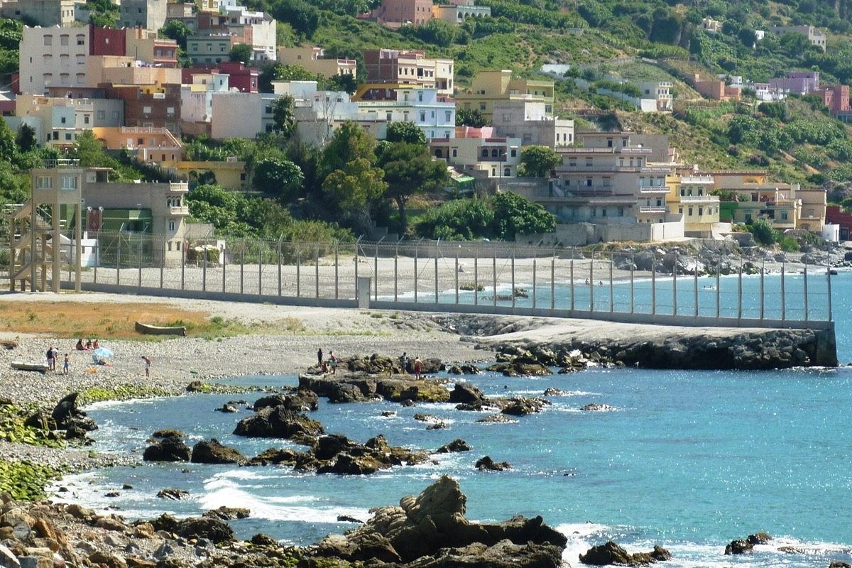 The Ceuta border fence running into the sea near Benzu, on the western edge of the city