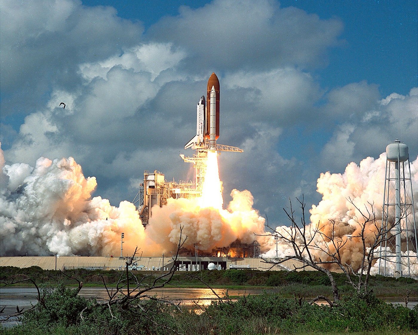 Space Shuttle Discovery rising from Pad 39B on STS-26 with its redesigned boosters