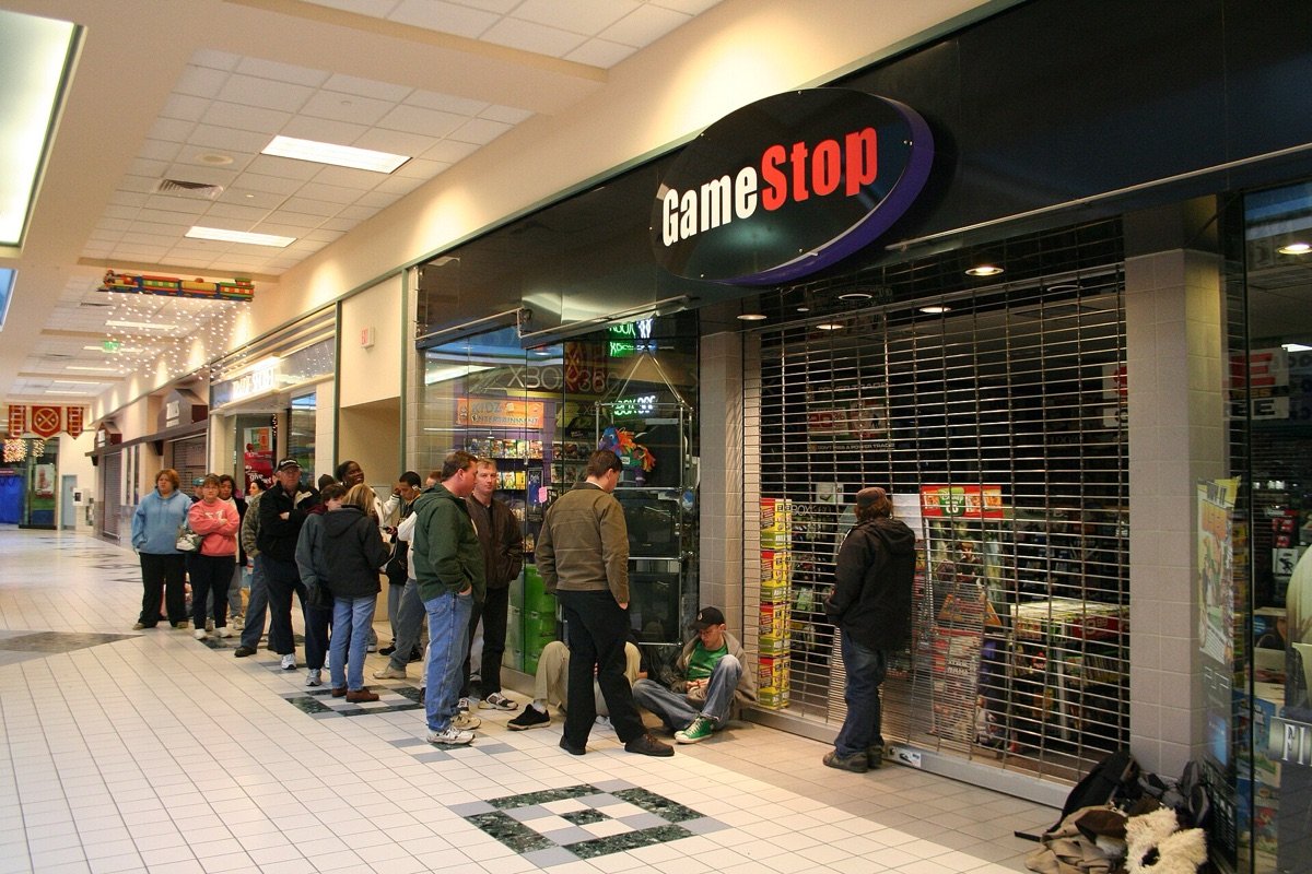 Shoppers queue outside a mall GameStop for a console launch in 2006, the physical-games business that short sellers bet was dying