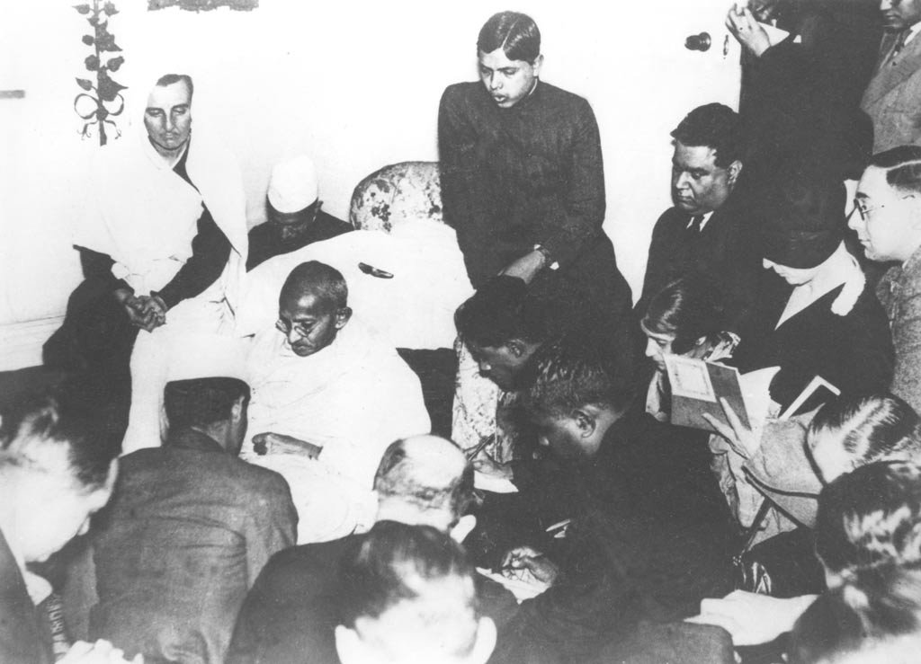 Mahatma Gandhi talks to journalists at the Round Table Conference in London, 1931