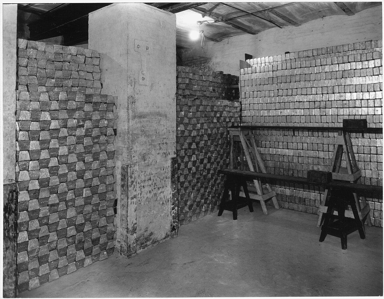 Gold bars stacked in a US government vault, around 1935