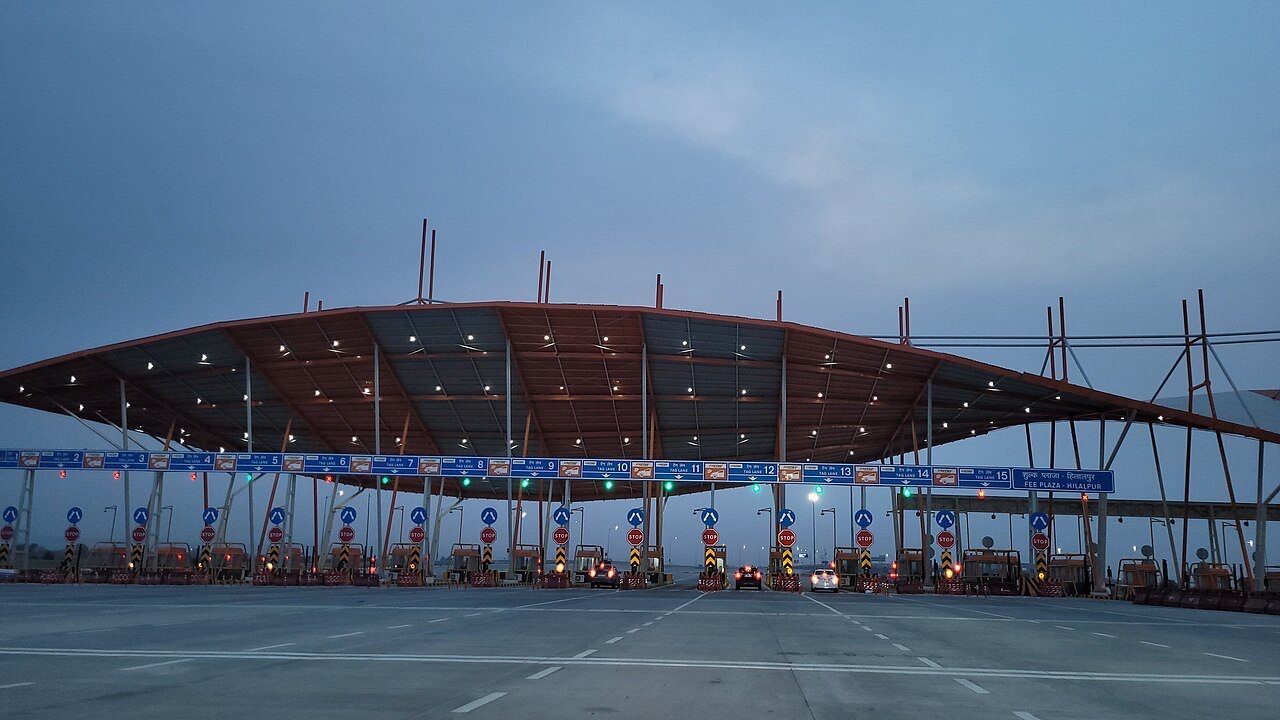 A multi-lane toll plaza at Hilalpur in 2023