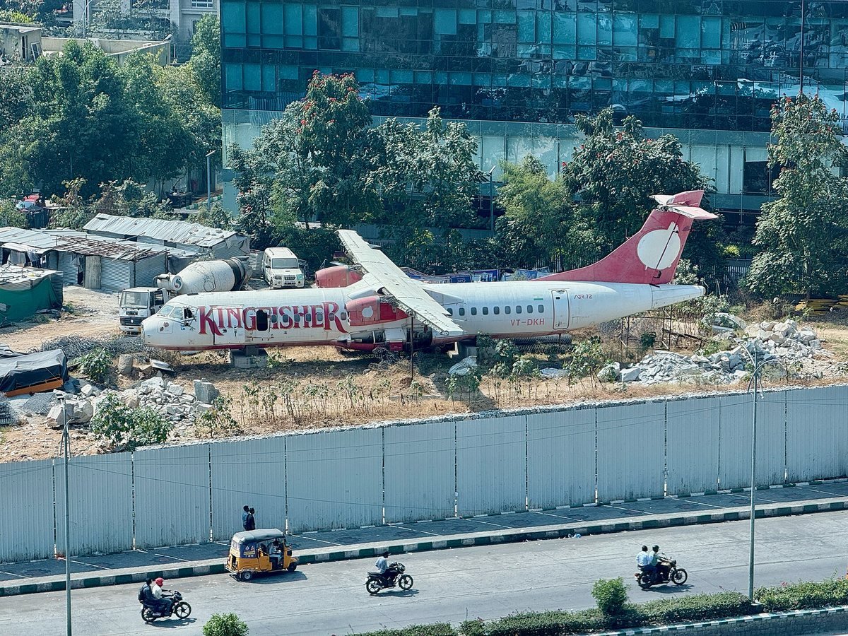 A former Kingfisher Airlines ATR 72-500, VT-DKH, abandoned beside a road and photographed in January 2025