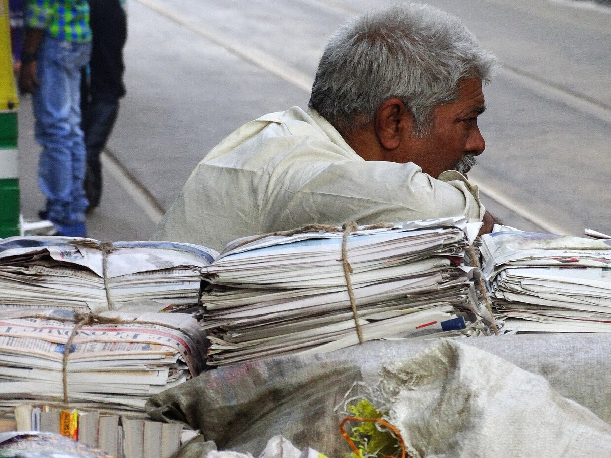 Bundles of newspapers at a roadside stand in BBD Bagh, Kolkata, in 2014