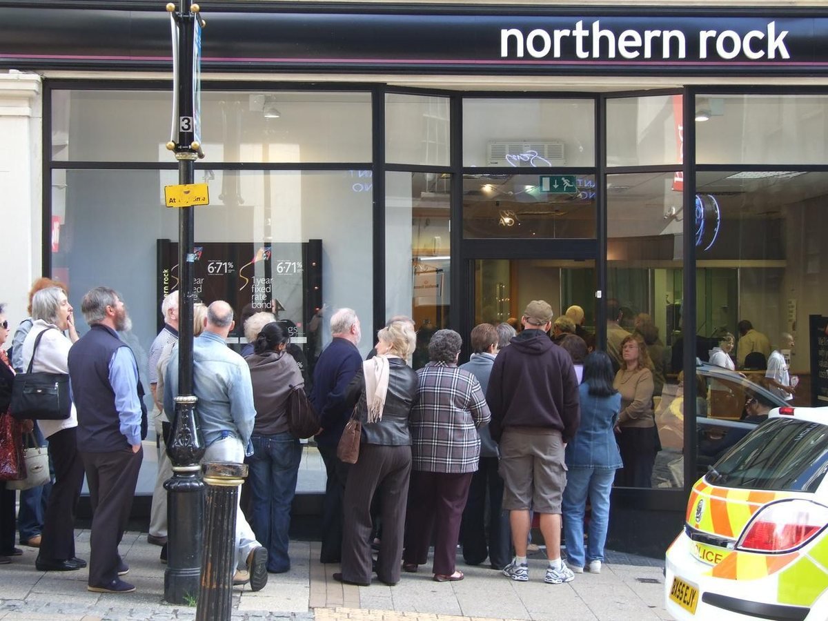 Savers queue outside a Northern Rock branch in Birmingham on Saturday 15 September 2007