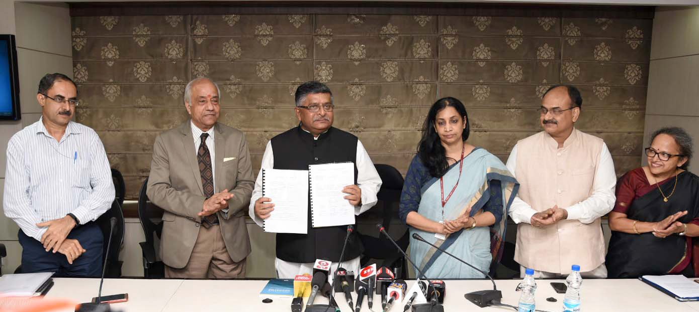 Justice B.N. Srikrishna hands the committee’s data protection report to IT and Law Minister Ravi Shankar Prasad
