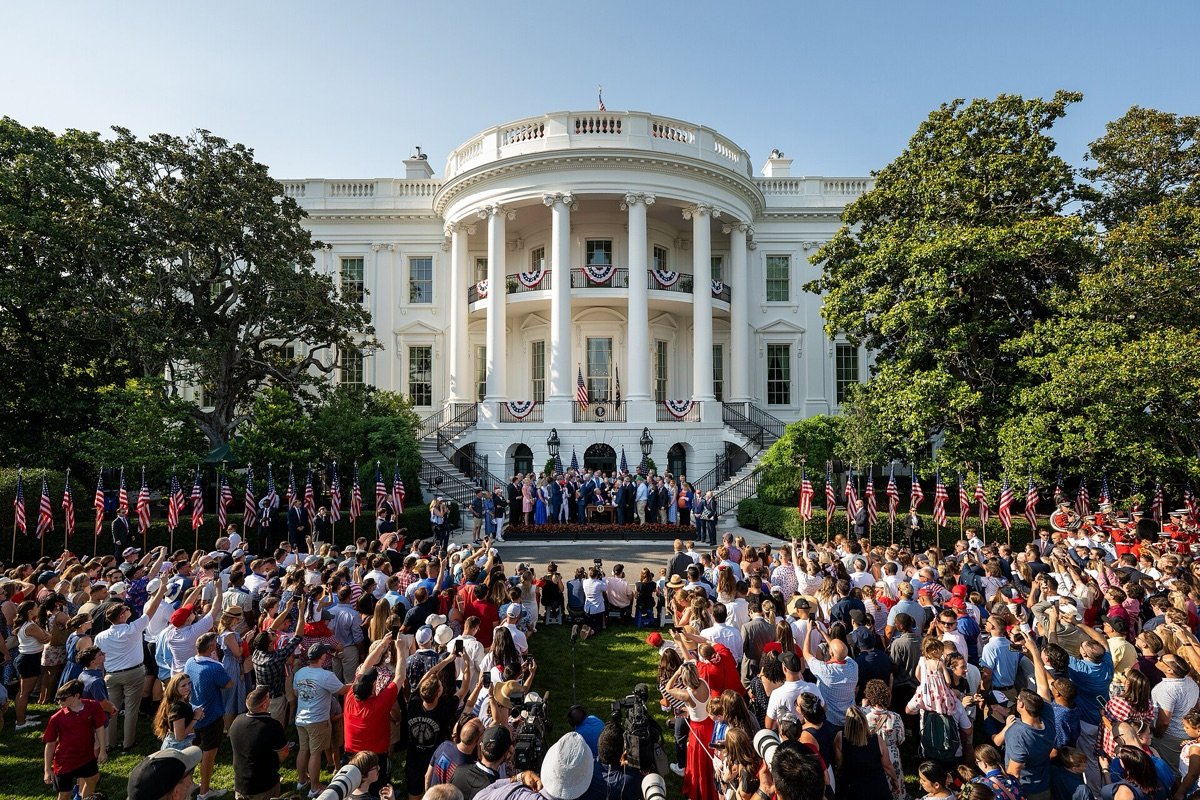 President Donald Trump signs the One Big Beautiful Bill Act, which raised the debt limit by $5 trillion, on the South Lawn on 4 July 2025