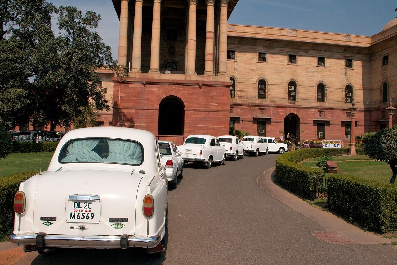 White Ambassador cars outside North Block, New Delhi, in 2009