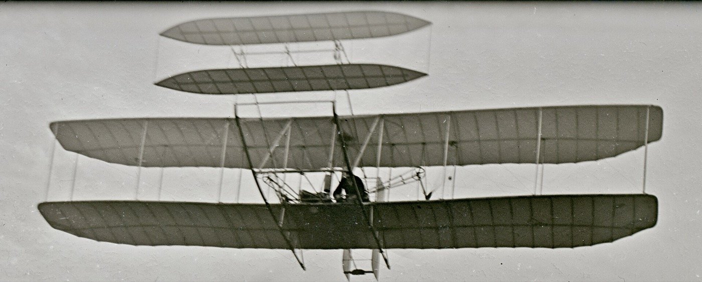 Front view of the Wright Flyer III in flight over Huffman Prairie, Dayton, Ohio
